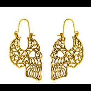 Hallowed out, gold toned sugar skull earrings